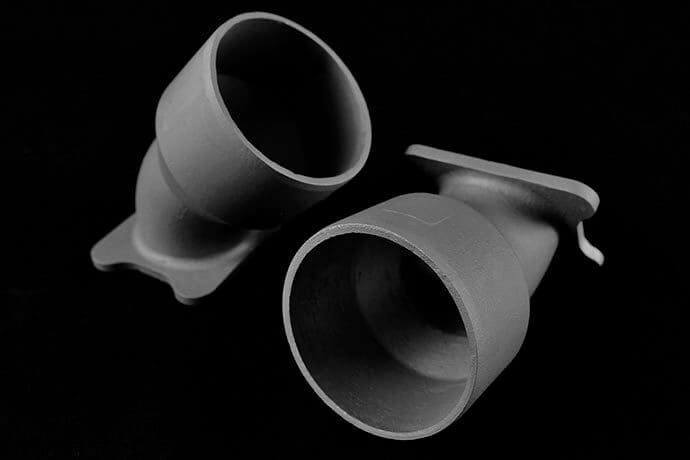 Inconel nickel investment cast parts on a black background