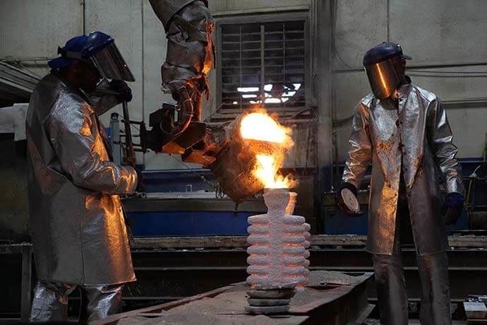 Hot metal being poured into a cast