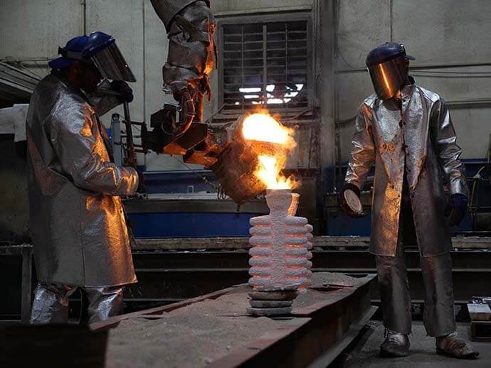 Hot metal being poured into a cast